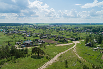 Kaygorodskoe village, Houses and gardens. Russia, Sverdlovsk region. Aerial, summer, sunny