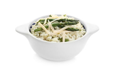 Delicious risotto with asparagus isolated on white