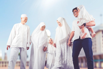 Happy multi-generation muslim family shot outdoor