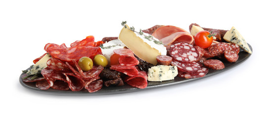 Slate plate with tasty ham and other delicacies isolated on white