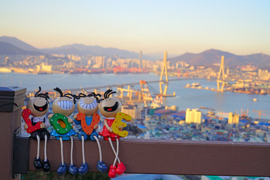 Love dolls with Busan port vew background Busan Korea