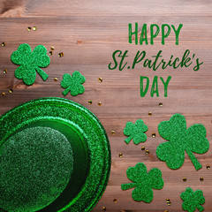 Happy Saint Patrick's Day greeting card with traditional symbols, shamrock, green attire. Green...