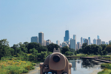 Chicago skyline behind telescope