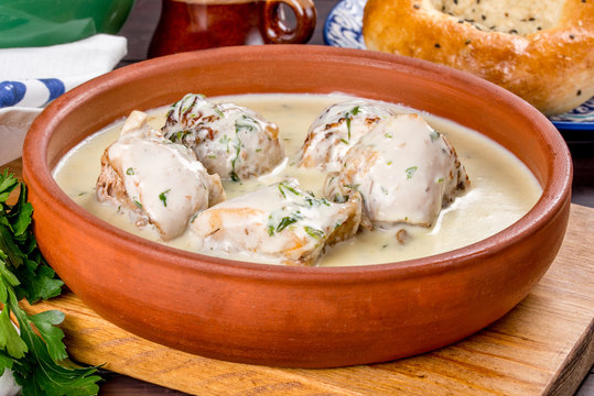 Georgian dish with chkmeruli meat. Close-up shot