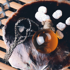 Alchemical aroma oils, perfume fragrances with  flower and stone