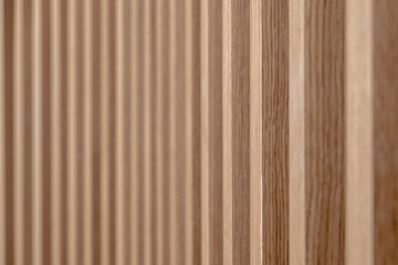 Obraz premium Wall decorated with wooden planks. Futuristic geometric wall design. Wood texture.