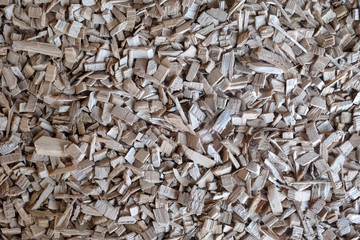 Wood chips, sawdust pile. Biofuel component. Biomass energy.