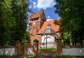 Gothic church of St. Anthony Abbot (Antoniego Opata) in Wozlawki, Warmia, Poland.  - obrazy, fototapety, plakaty