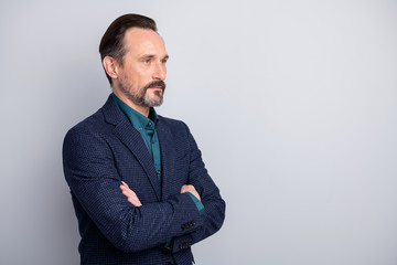 Profile side view portrait of his he nice attractive content middle age man in old-fashioned formalwear folded arms professional expert isolated over light white gray pastel color background