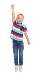 Cute little boy jumping on white background