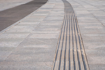 Sidewalk guide for blind people.