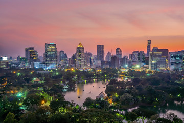 Fototapeta na wymiar Downtown Bangkok city skyline with Lumpini park from top view in Thailand