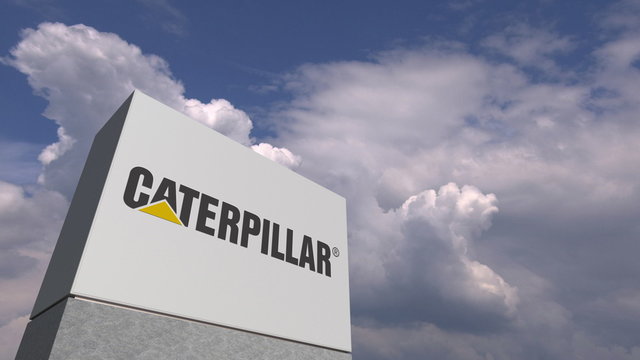 Logo of CATERPILLAR on a stand against cloudy sky, editorial 3D rendering