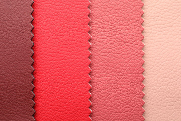 Fototapeta premium Leather samples of different colors for design as background, closeup