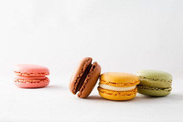 delicious multi flavor  Macarons on white background with space for text