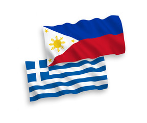 National vector fabric wave flags of Greece and Philippines isolated on white background. 1 to 2 proportion.