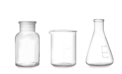 Clean empty laboratory glassware isolated on white