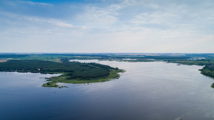 Aerial view. Beautiful landscape lake in the green forest. Forest lake summer landscape. Beauty concept background.