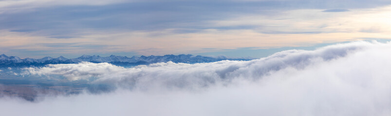 Fototapeta premium West Tatras mountains over the clouds from Babia Hora hill, Slovakia