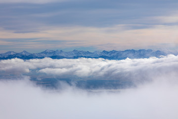 West Tatras mountains over the clouds from Babia Hora hill, Slovakia