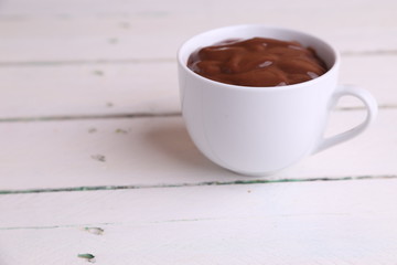 white cup of delicious chocolate