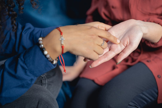 Female Palm Reader Foretelling Her Clients Future