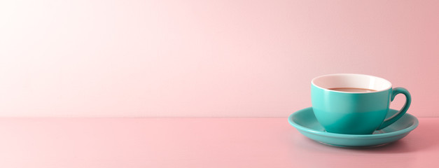 Fototapeta A cup of fresh coffee on pink background obraz