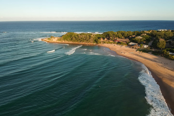 drone shot of a beach with native residents