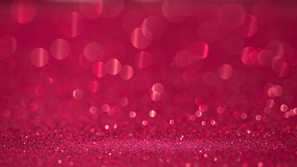 pink background of abstract glitter lights.