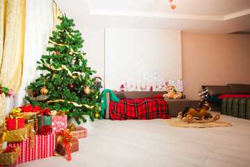 The living room is decorated in Christmas style