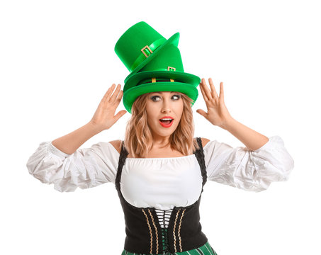 Funny young woman on white background. St. Patrick's Day celebration