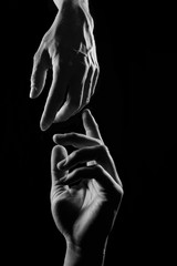 Male and female hands - black and white