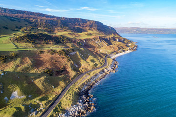 Atlantic coast of Northern Ireland, Antrim Coast Road, a.k.a Causeway Coastal Route,  One of the most scenic coastal roads in Europe. Aerial view in winter