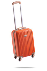 Studio shot of a flying orange suitcase cut out on white background