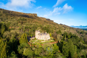 Cave Hill Country Park and Belfast castle, built in 19th century. Tourist attraction  in Belfast, Northern Ireland. Aerial view