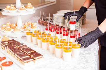 Delicious wedding reception candy bar dessert table