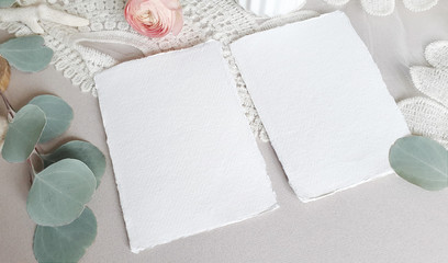 Blank white Wedding Greeting invitation card mockup silver eucalyptus leaves branch, blush pink...