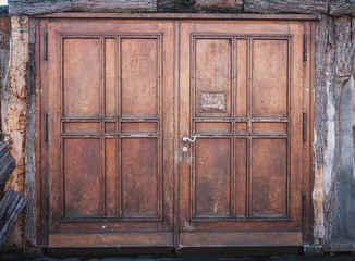 wooden door or wood gate with closed doors