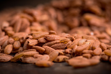Raw red rice Dev-zira on the kitchen table. Selective focus. shallow depth of field.