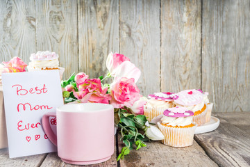 Happy moms day background with cupcakes