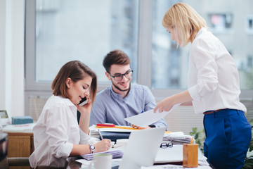 Fototapeta premium Team of architects working in the office