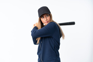 Young blonde woman playing baseball over isolated background