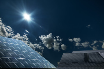 Solar Panels Against The Deep Blue Sky