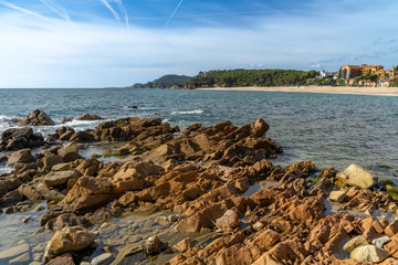 Fenals beach in Lloret de Mar, Costa Brava de Griona, without people, promenade of the sea