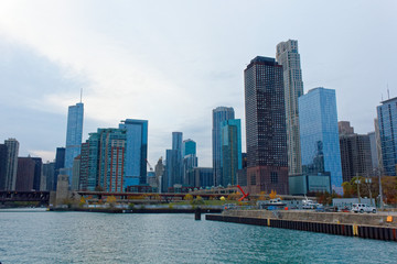 Fototapeta na wymiar Building skyline of Chicago downtown with a bay area