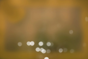 Abstract background of soft golden bokeh 