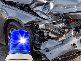 Blaulicht mit Autowrack Verkehrsunfall