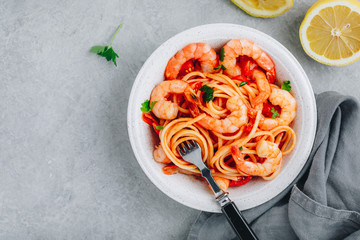 Italian food shrimp spaghetti pasta with tomato sauce