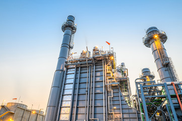 Glow light of petrochemical industry on sunset and Twilight sky ,Power plant,Energy power station...