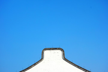 Partial close-up of the eaves of Chinese ancient buildings under the blue sky